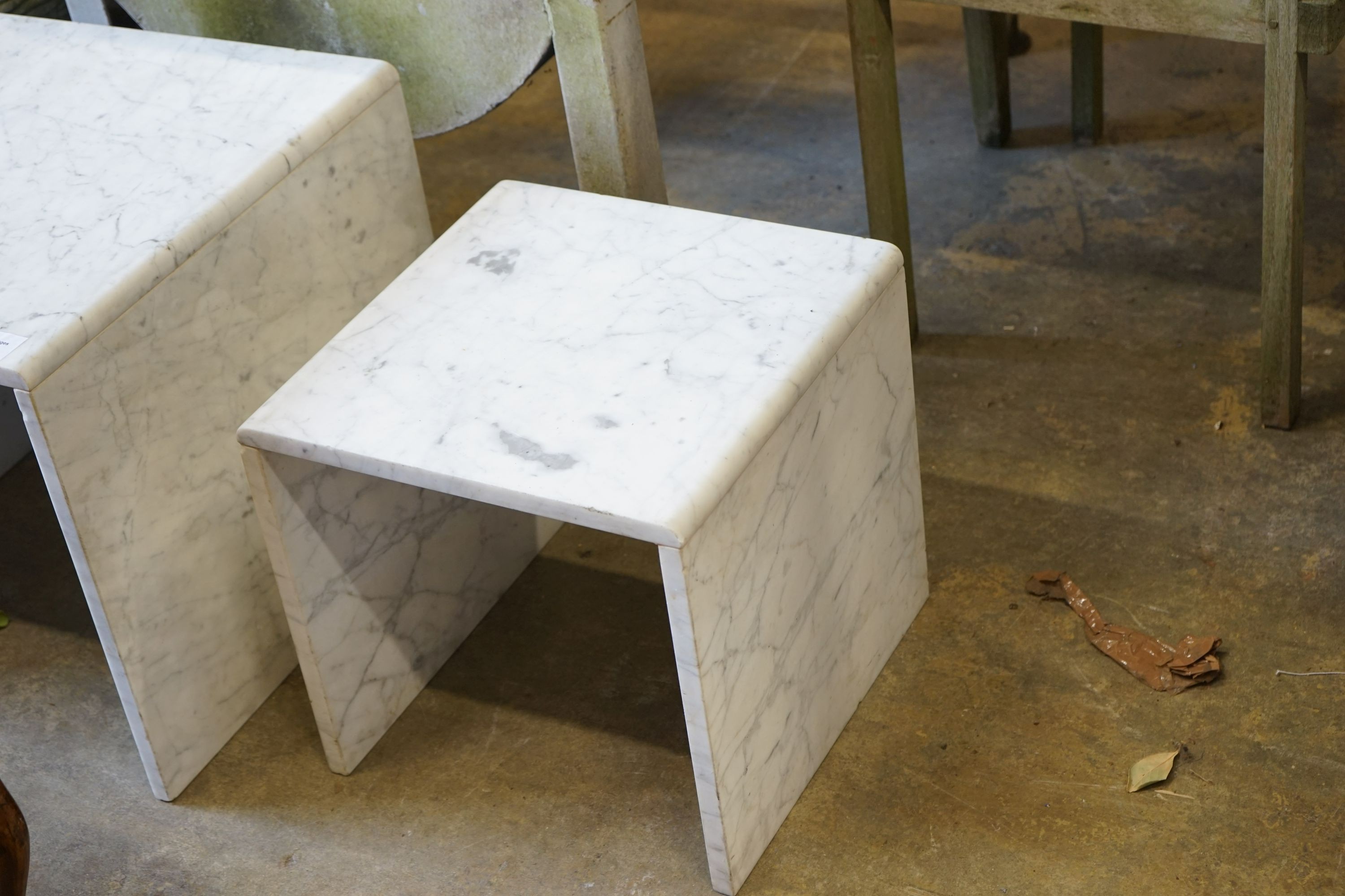 A pair of composite marble occasional tables, larger width 50cm, depth 50cm, height 44cm